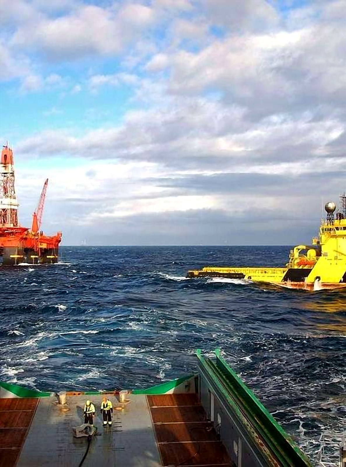 Crew on the deck of an offshore support vessel